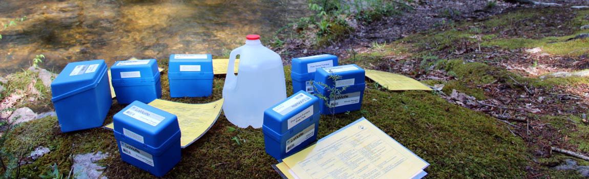 Chemical test kits sit near a stream ready for a Watershed Education program, Pennsylvania State Parks.